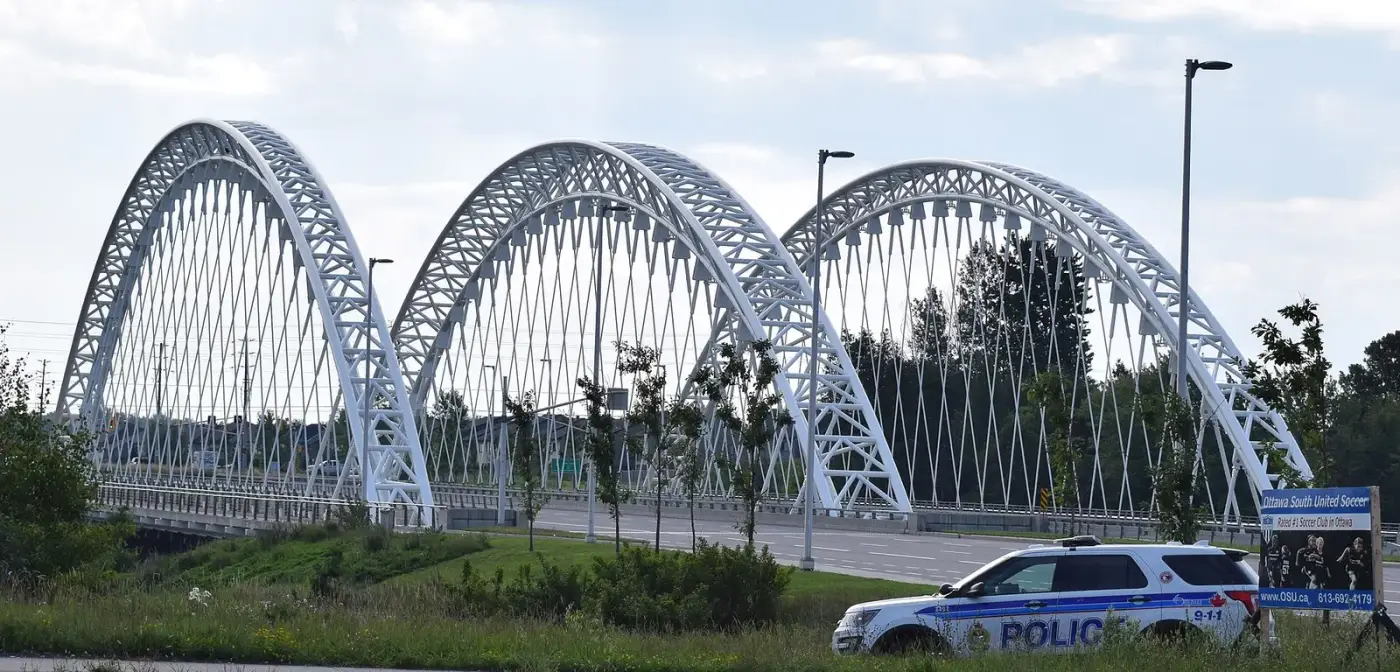 White arched Vimy Memorial Bridge across the Rideau River
